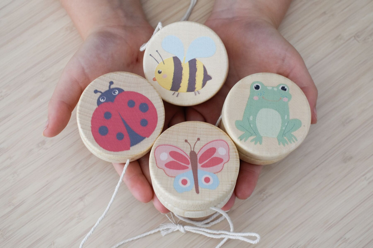 WOODEN SPRING INSECT YO YO SET OF 4