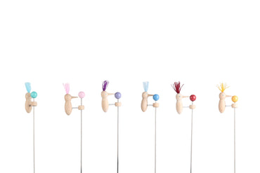 Set of six Kaper Kidz Bobbing Beak Woodpecker toys with colorful wooden beaks and natural wood finish, designed for children.