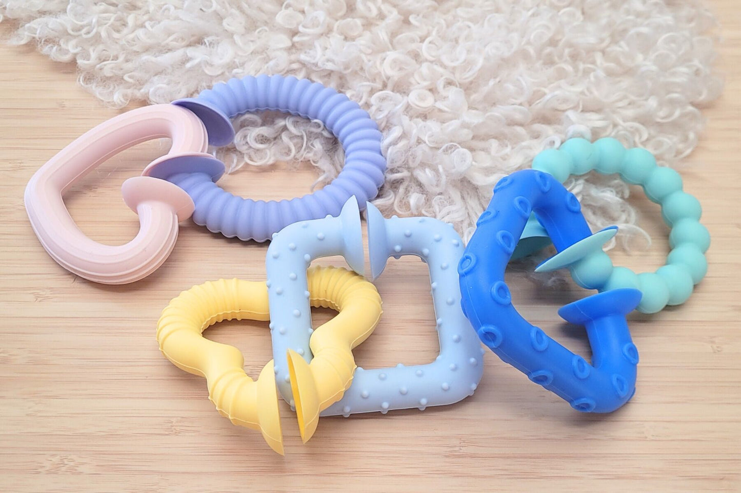 SILICONE SNAP & LEARN SENSORY TEETHERS