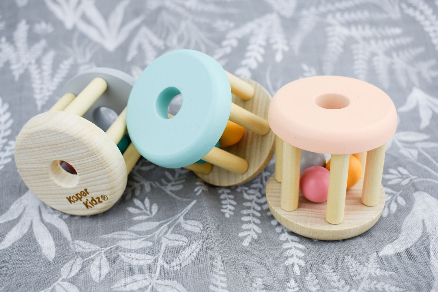Kaper Kidz Calm & Breezy Wooden Rattle with smooth natural wood finish and colorful beads for sensory play and baby development