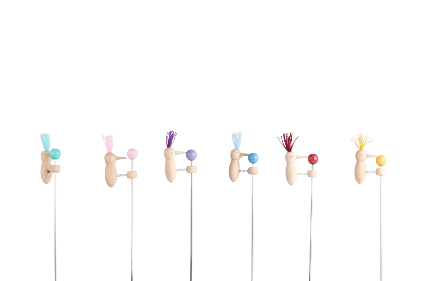 Set of six Kaper Kidz Bobbing Beak Woodpecker toys with colorful wooden beaks and natural wood finish, designed for children.