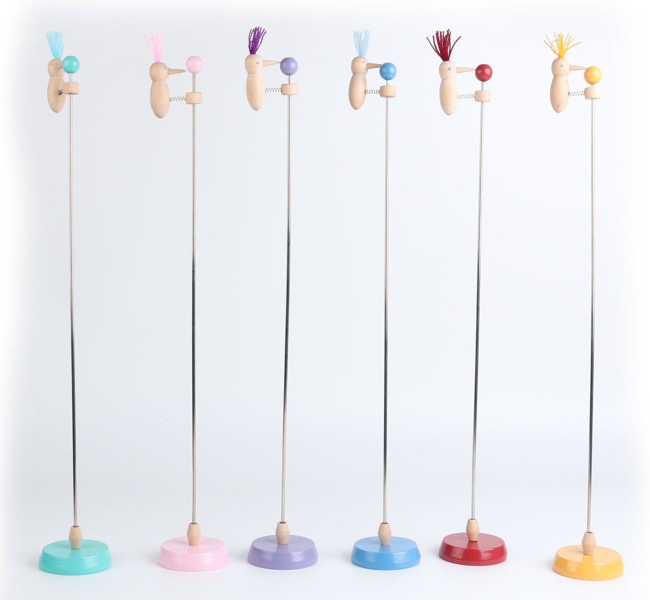 Set of 6 Bobbing Beak Woodpecker toys by Kaper Kidz, colorful wooden bird figures with bobbing beak feature for kids' play.