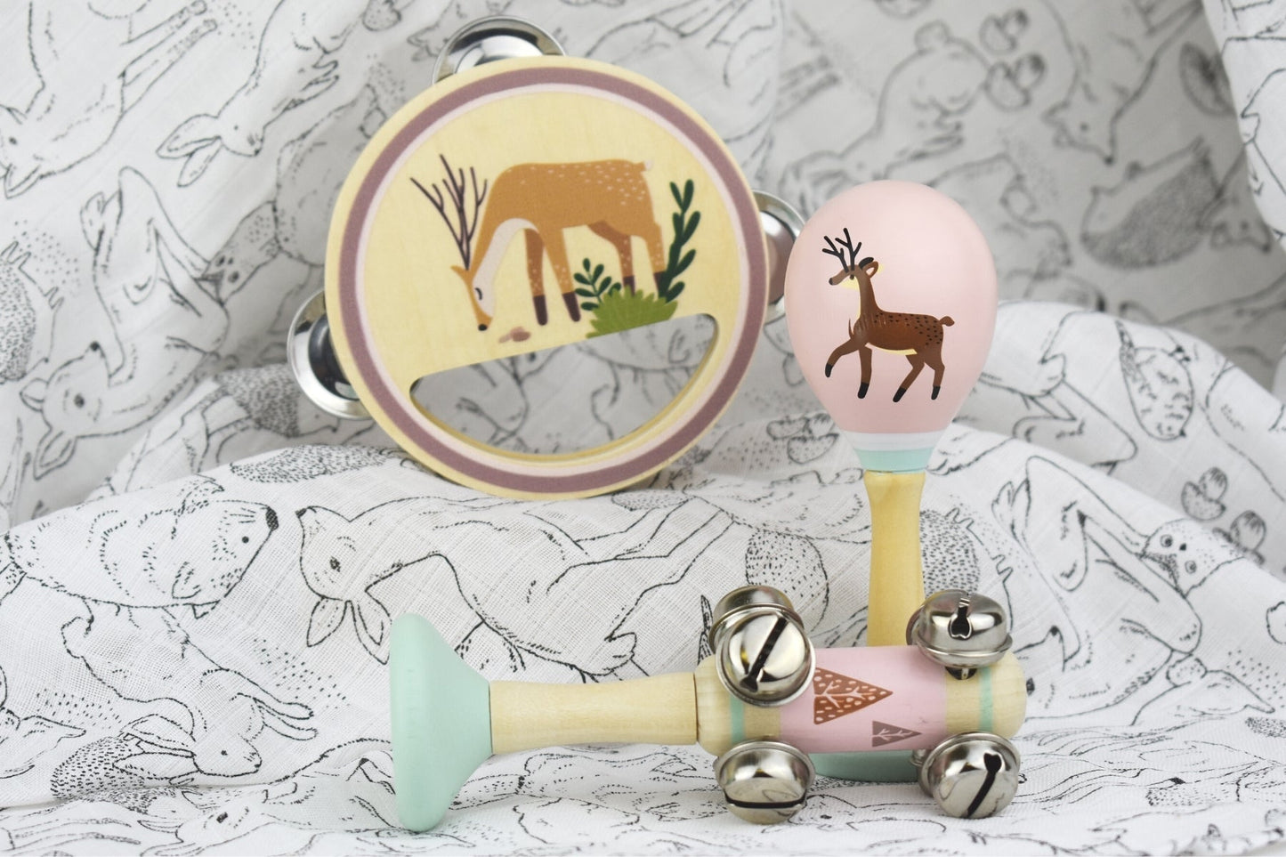 Kaper Kidz Calm & Breezy Deer wooden musical set with three colorful animal instruments on a wooden surface.