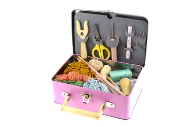 Kaper Kidz Calm & Breezy Knitting Kit in a compact tin case, includes yarn and knitting tools for kids' craft projects.