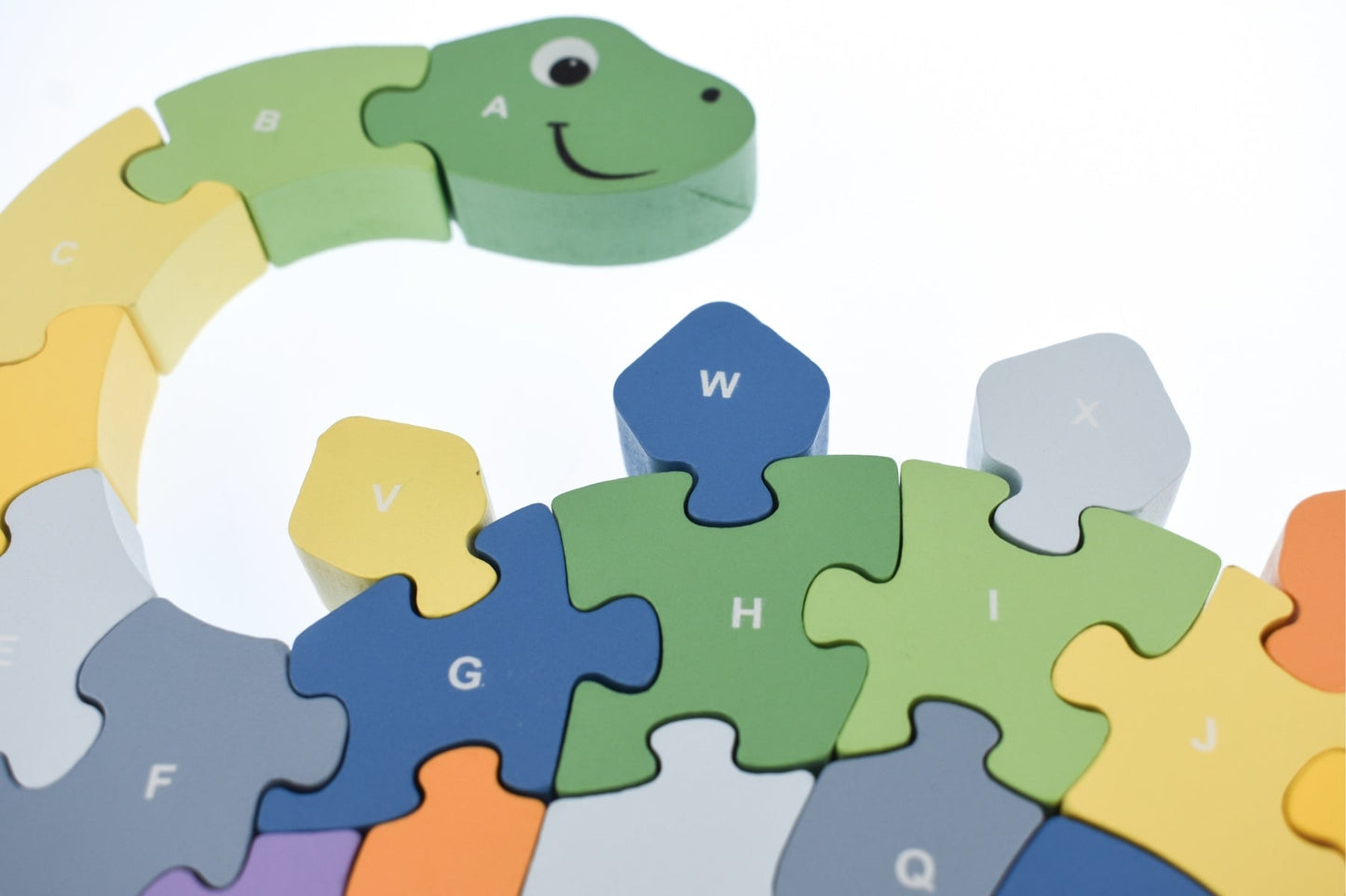 Kaper Kidz Dinosaur A-Z Chunky Jigsaw Puzzle featuring colorful dinosaur illustrations for young children.