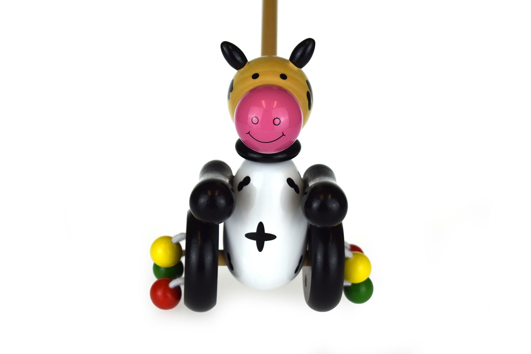Kaper Kidz wooden push-along cow toy for toddlers, featuring a friendly cow design and sturdy wooden construction.