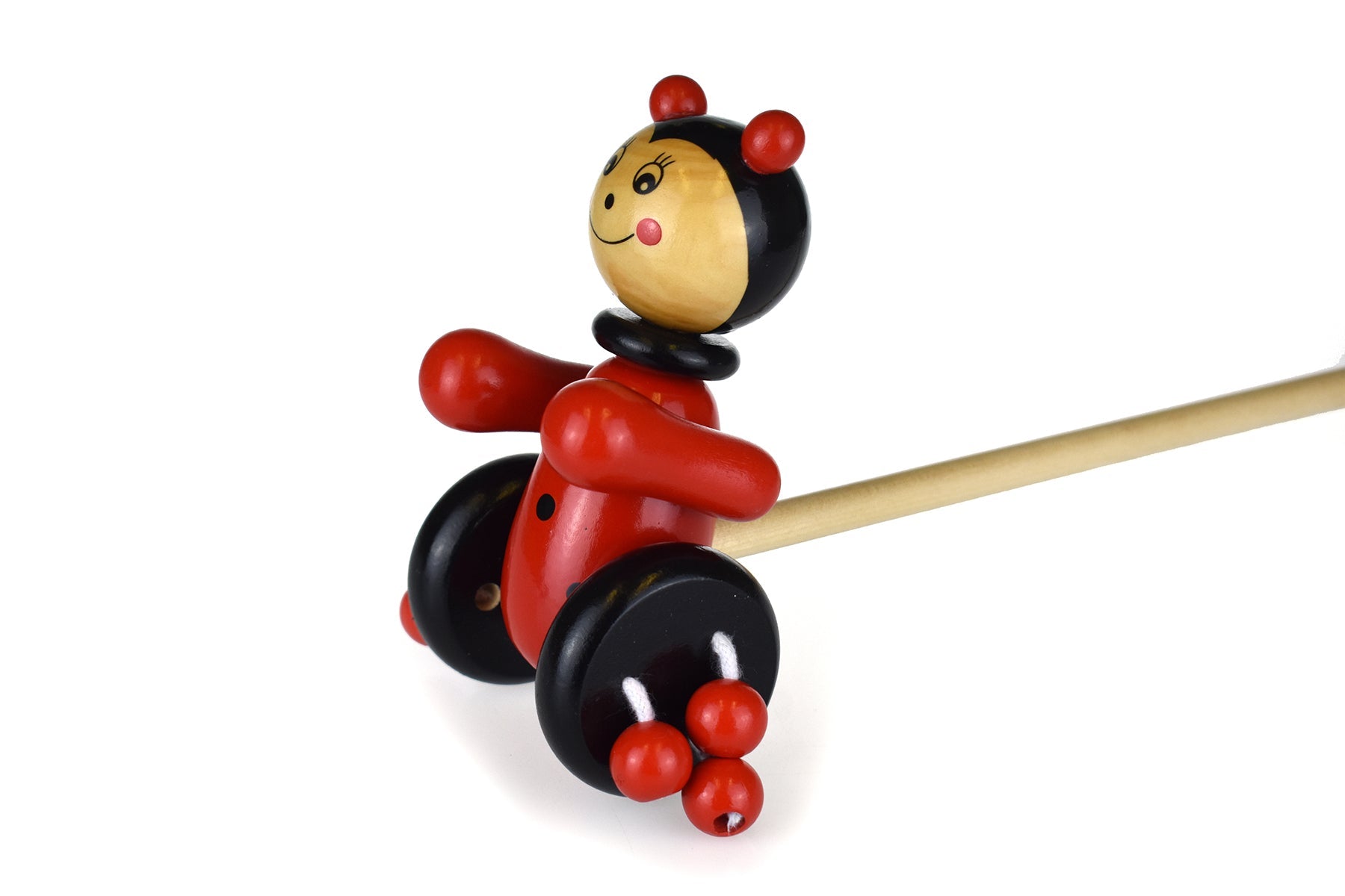 Wooden ladybird push-along toy by Kaper Kidz, featuring bright red and black ladybird design with a sturdy handle for children to pull.