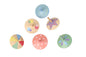 Six colorful Kaper Kidz Sundae Spinning Tops in vibrant designs, perfect for kids' play and entertainment.