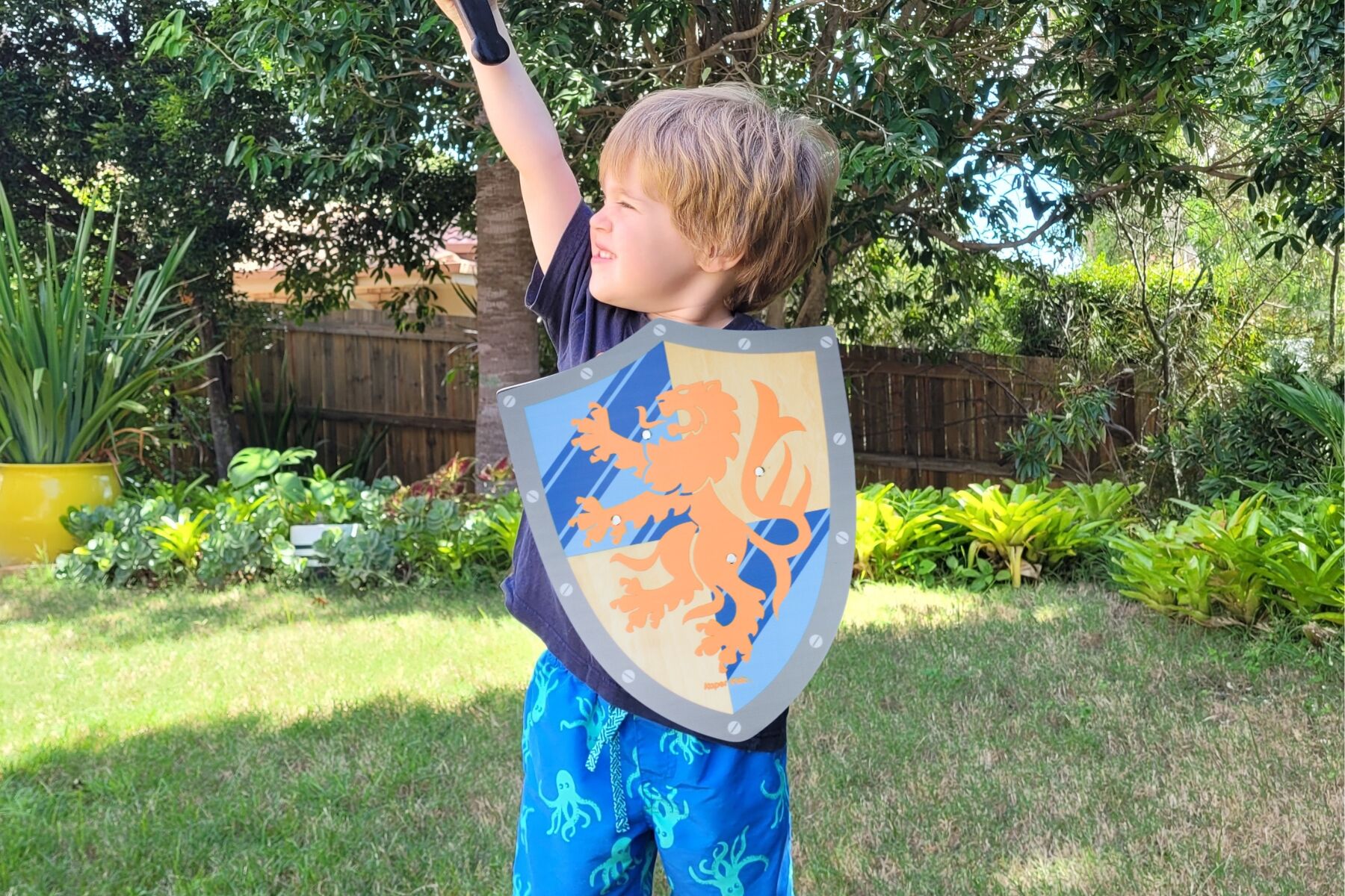 Kaper Kidz Sword and Shield Lion toy with a lion figure holding a sword and shield, designed for imaginative play.