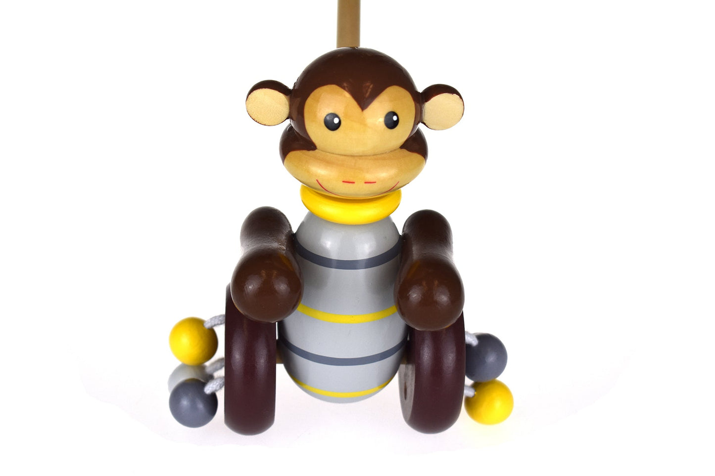 Kaper Kidz Push-a-Long Monkey toy with a smiling monkey figure on a wooden push-along base for toddlers