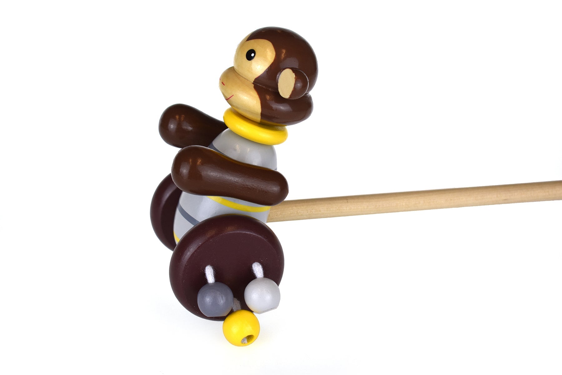 Kaper Kidz push-a-long monkey toy with wooden wheels and colorful features for young children.