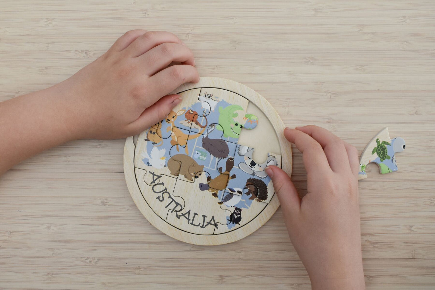 Wooden 9-piece Australian animal map jigsaw puzzle by Koala Dream, featuring colorful images of native Australian animals.