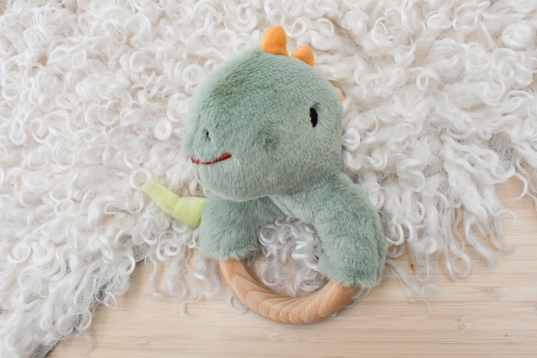 SNUGGLE BUDDY MINTY DINOSAUR WOODEN RING RATTLE - Bamboo Sprout