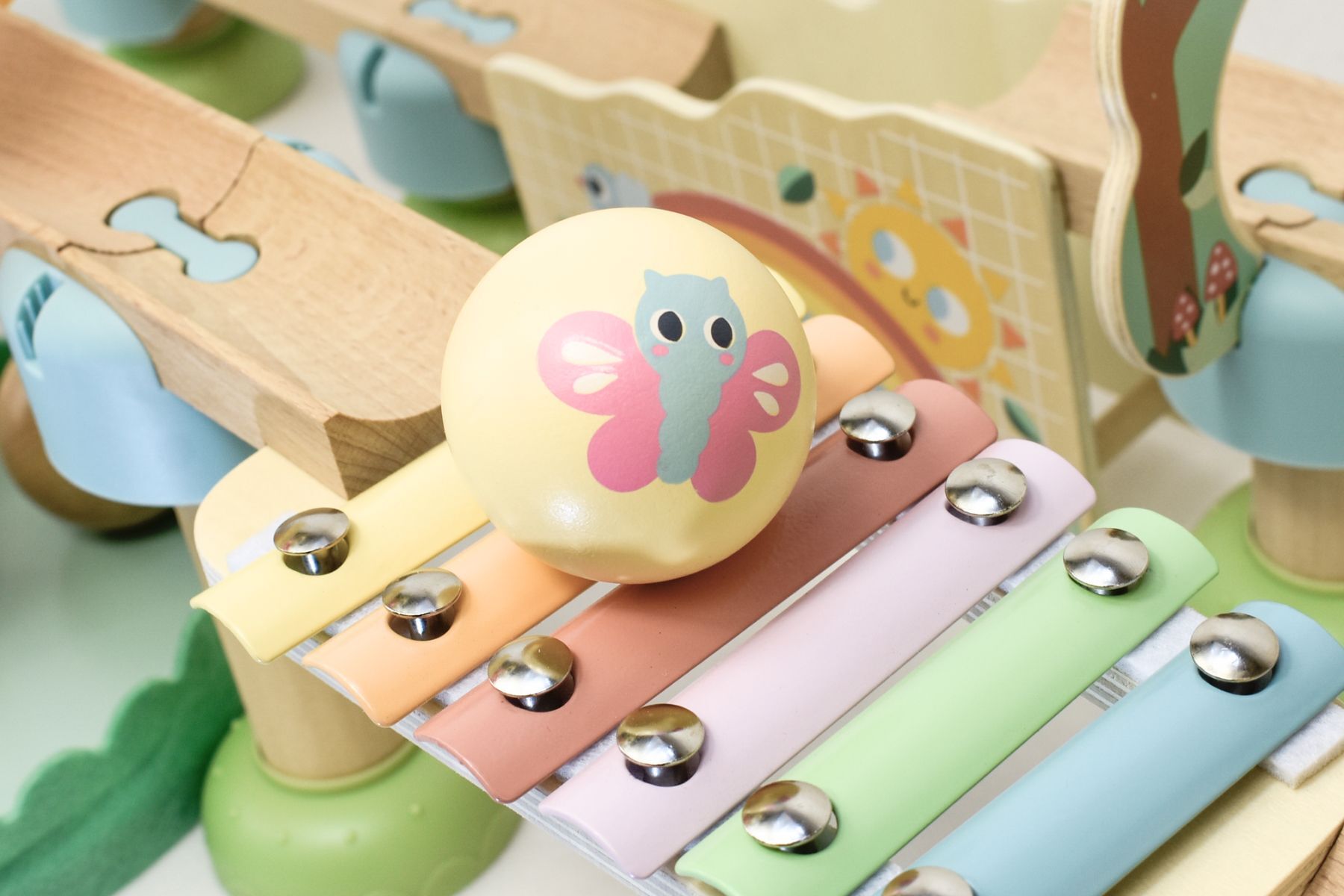 Tooky Toy Forest Friends Ball Drop Track Set with colorful wooden tracks, forest-themed characters, and ball chutes for kids.