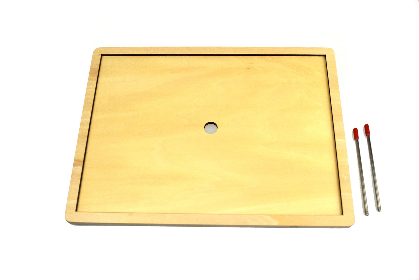 Small wooden jigsaw puzzle frame by Tooky Toy, designed for children's puzzle activities, with colorful puzzle pieces.