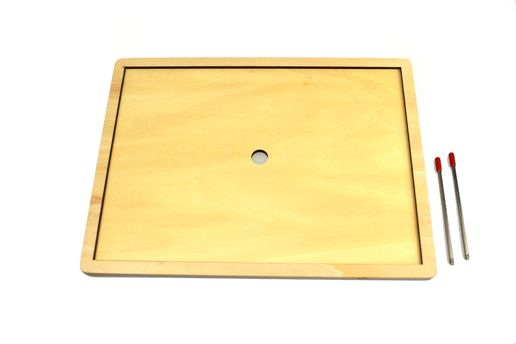 Small wooden jigsaw puzzle frame by Tooky Toy, designed for children's puzzle activities, with colorful puzzle pieces.