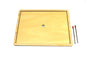 Small wooden jigsaw puzzle frame by Tooky Toy, designed for children's puzzle activities, with colorful puzzle pieces.
