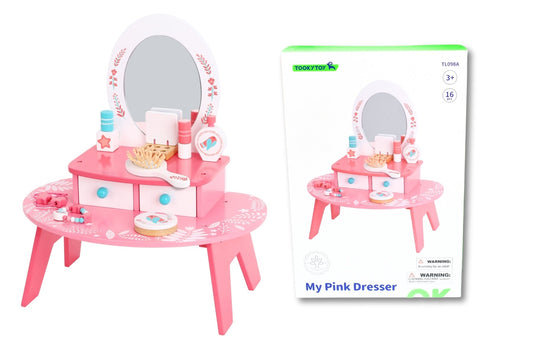 Pink Tooky Toy dresser with multiple drawers and decorative handles, designed for children's playroom or bedroom decor.