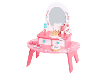 Pink toddler dresser by Tooky Toy featuring multiple drawers and a smooth finish, perfect for children's bedroom decor.